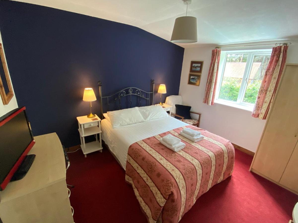 Glenan Lodge Self Catering Tomatin Eksteriør billede